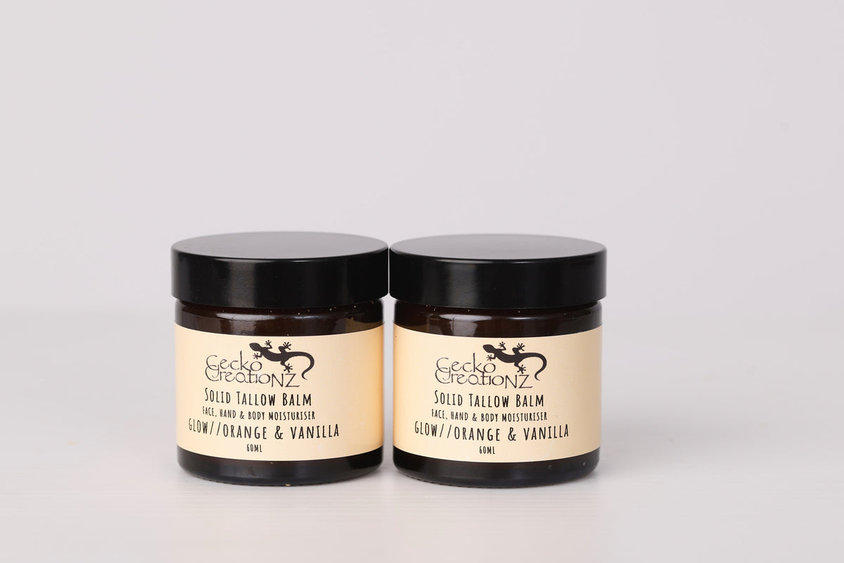 Glow Orange & Vanilla solid tallow balm, two jars